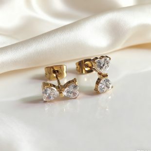 Light luxury temperament, versatile, super sparkling zircon bow earrings, simple personality, sweet titanium steel earrings